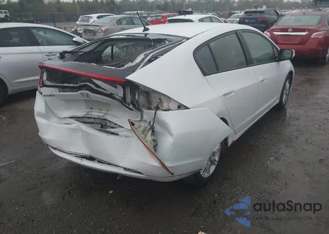 2010 Honda Insight Ex z USA, uszkodzony, nr VIN JHMZE2H7XAS007399